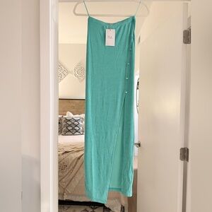 Chic Turquoise Maxi Skirt With High Slit.